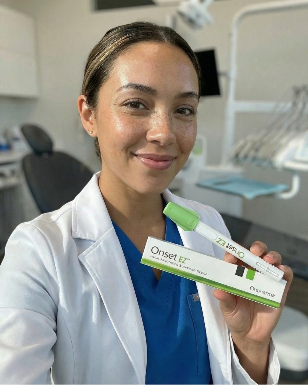Dentist holding the Onset EZ Pen and packaging